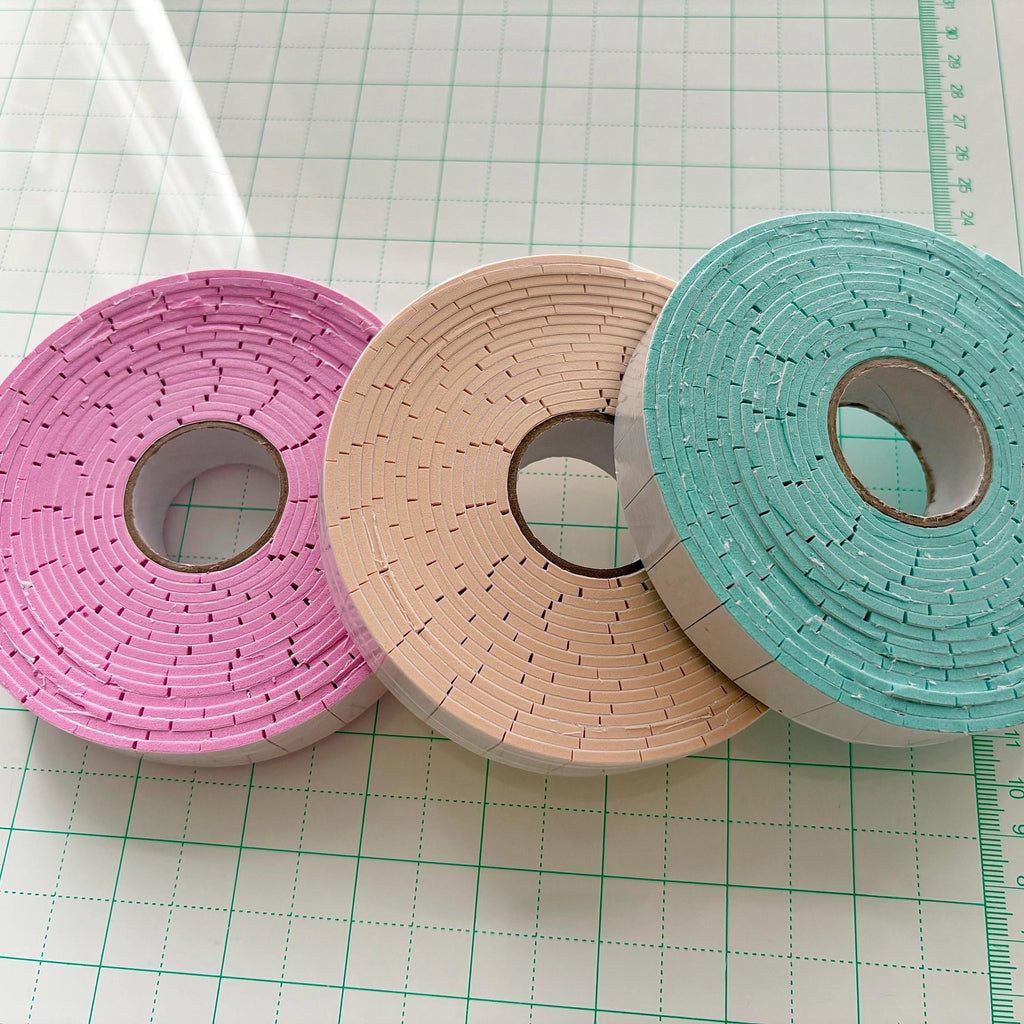Double sided adhesive foam tape